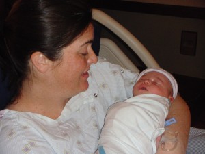 Sleeping in mommy's arm after coming back from the NICU (two and a half hours old)